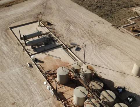 Aerial view of industrial storage tanks.